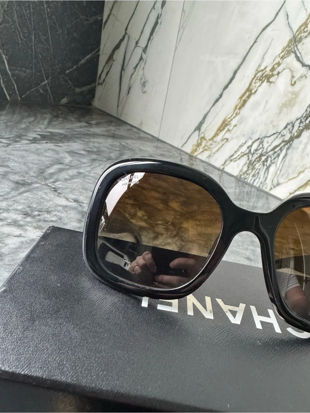 CHANEL Black Sunglasses with Gold Logo Accent